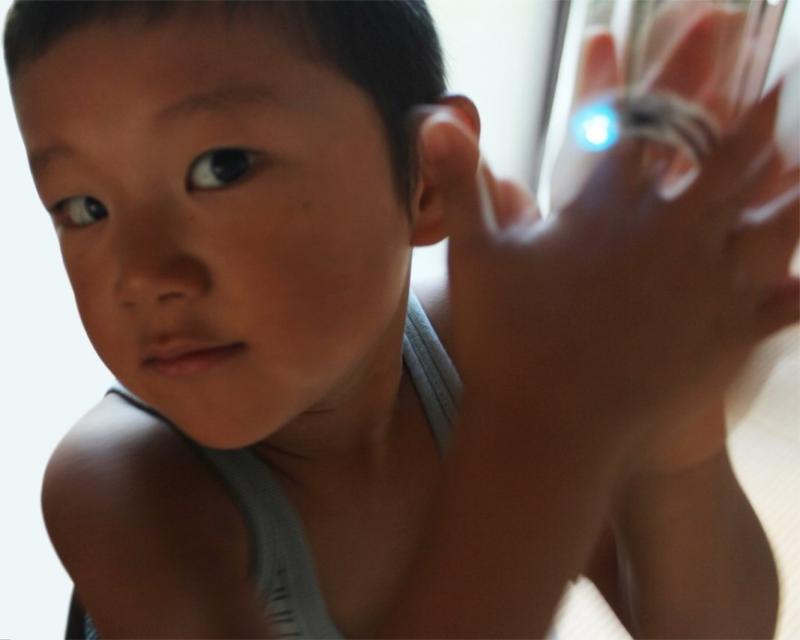 The photo of   a Child Enjoying a Clap Detection Light